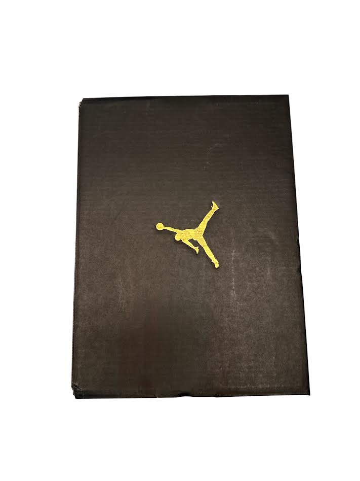 Black book with a yellow logo on a white background