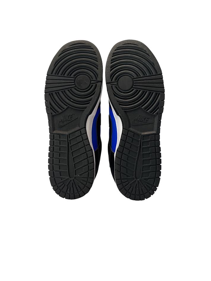 Black and blue athletic shoes with sole view on a white background