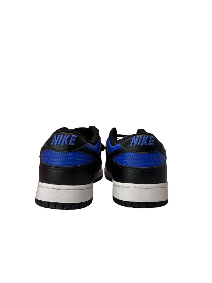 Black and blue Nike sneakers on a white background