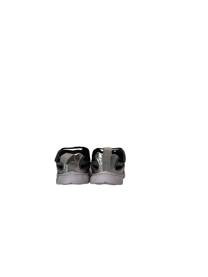 Pair of silver sneakers on a white background