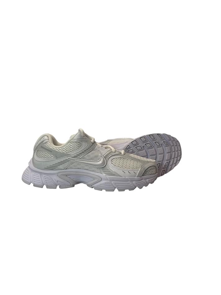 Light gray athletic shoe on a white background