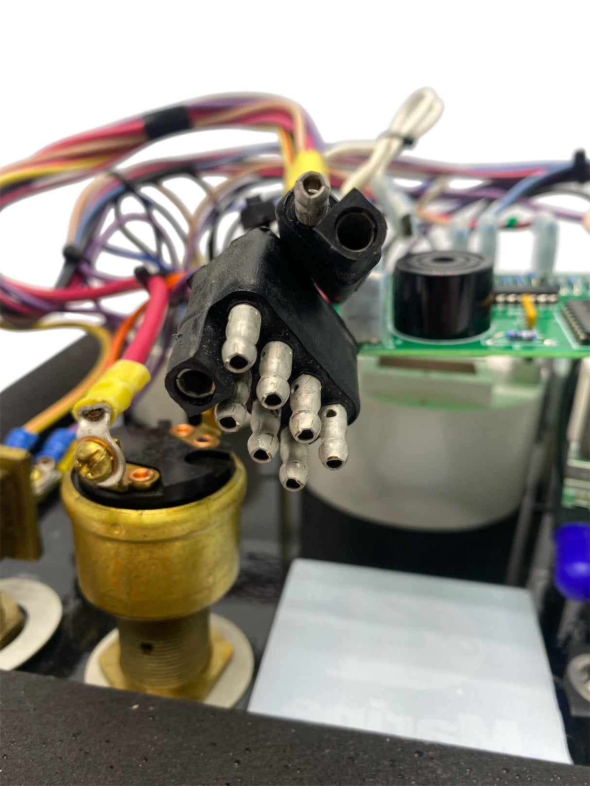Close-up of electronic components with wires and a circuit board.