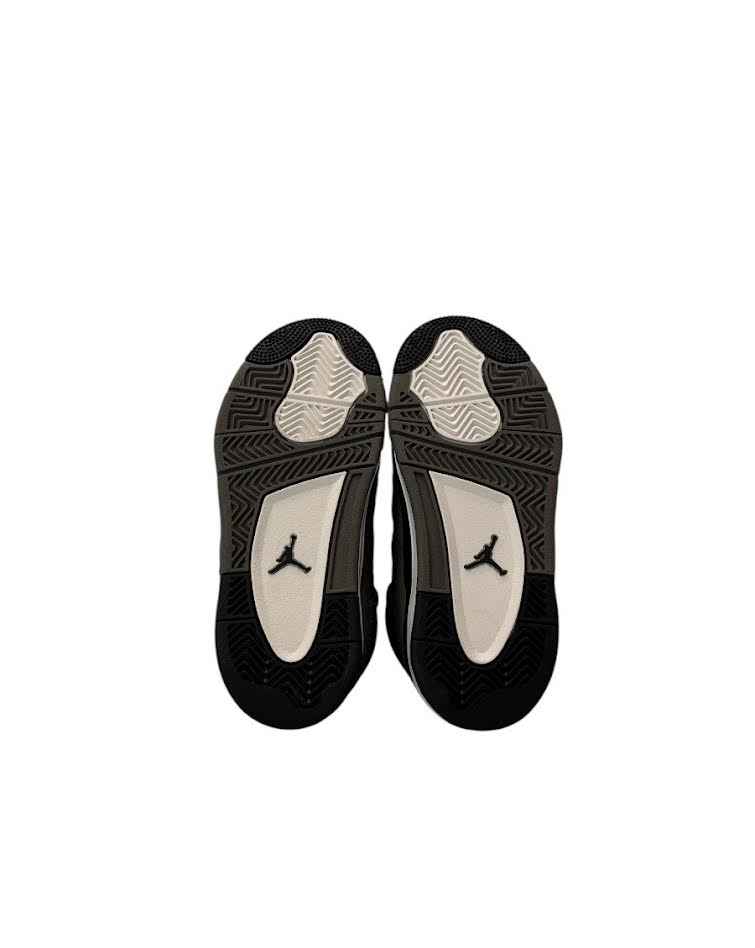 Black and white athletic shoes with a logo on a white background