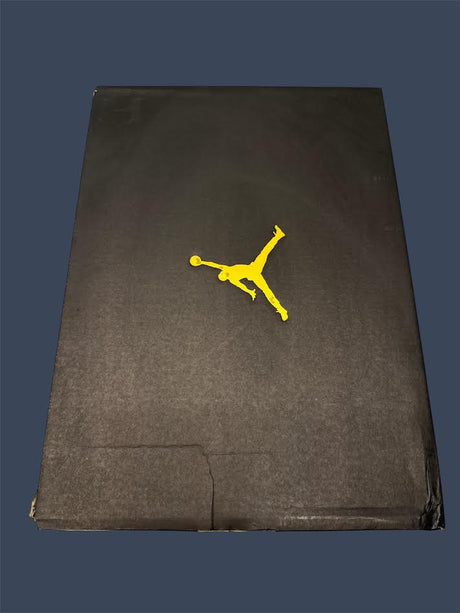 Black mat with a yellow logo on a blue background