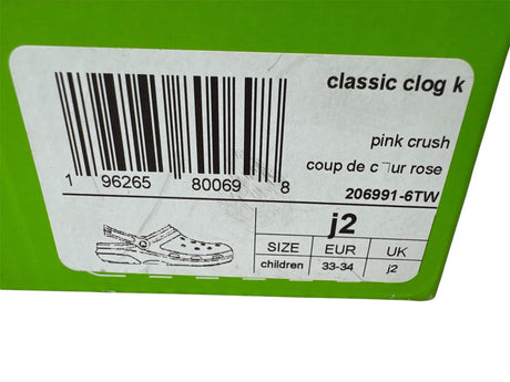 Product label with barcode and shoe size information on a green background