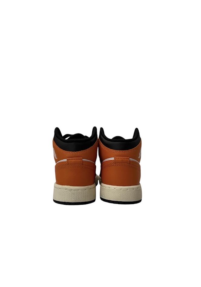 Pair of orange high-top sneakers with black soles on a white background
