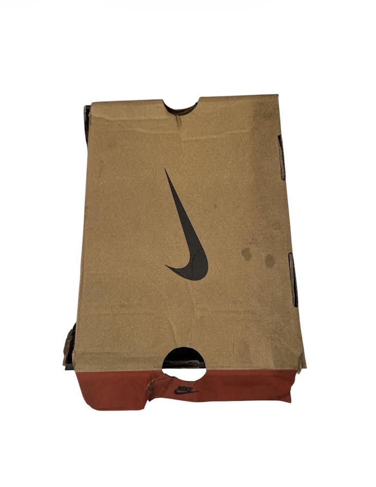 Brown paper bag with a black Nike logo on a white background