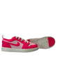 Pink and white sneaker on a white background
