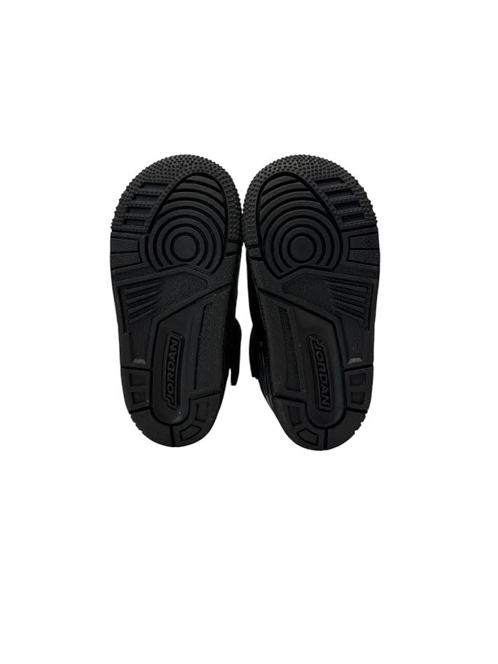 Black sole of a shoe on a white background
