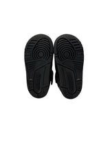 Black sole of a shoe on a white background