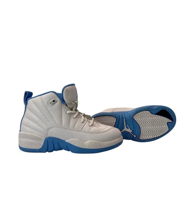 Pair of gray and blue sneakers on a white background