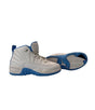 Pair of gray and blue sneakers on a white background