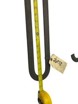 Black belt with yellow measuring tape and a tag on a white background