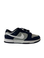 Navy and gray sneaker with Nike logo on a white background