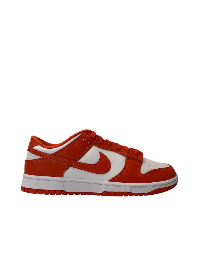 Red and white sneaker with a Nike logo on a white background