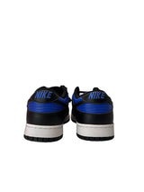 Black and blue Nike sneakers on a white background