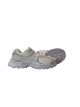 Light gray athletic shoe on a white background