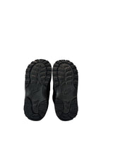 Black Nike shoes with sole view on a white background