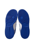Blue Nike sneakers shown from the sole on a white background