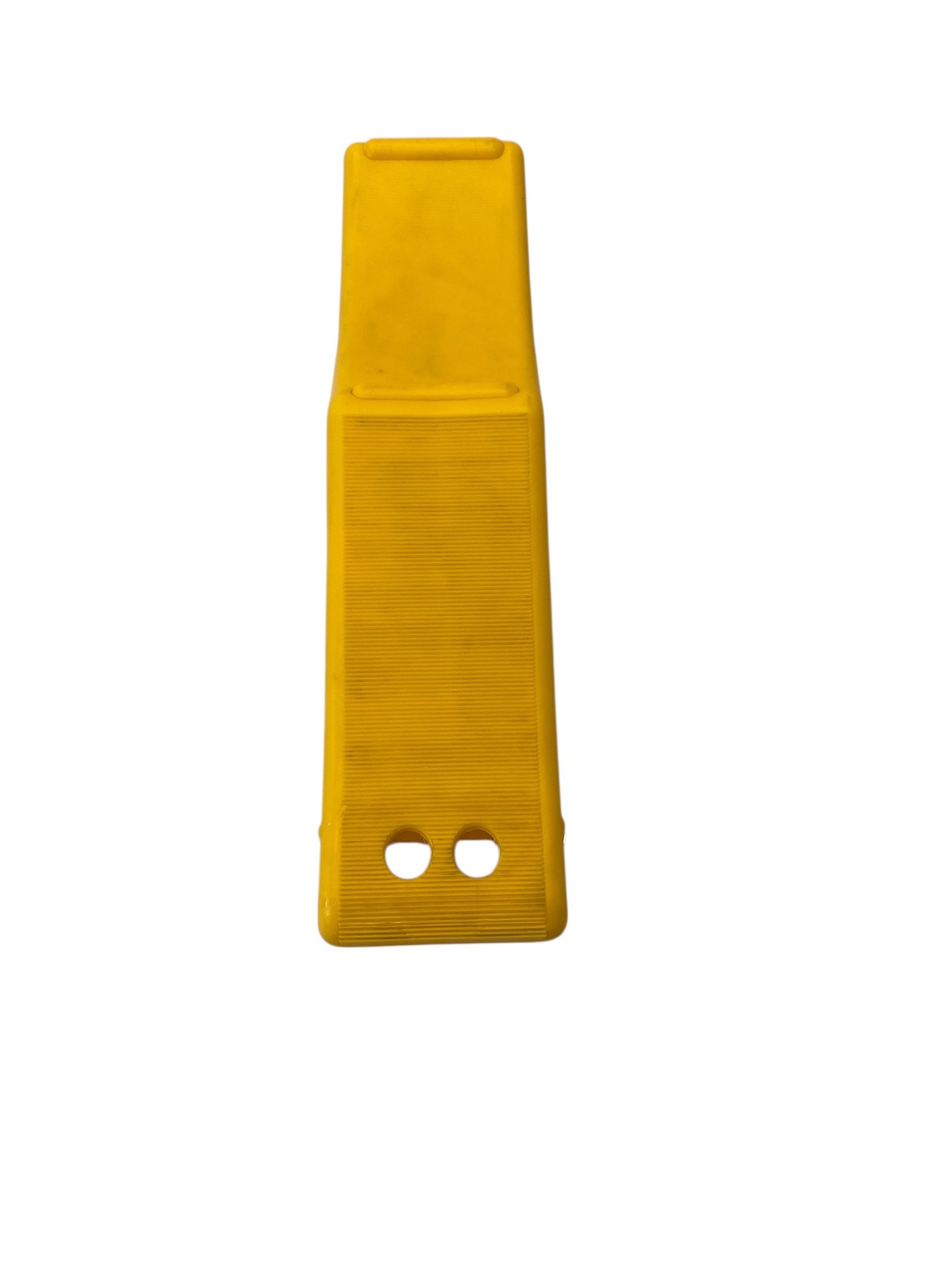 Yellow plastic ramp on a white background
