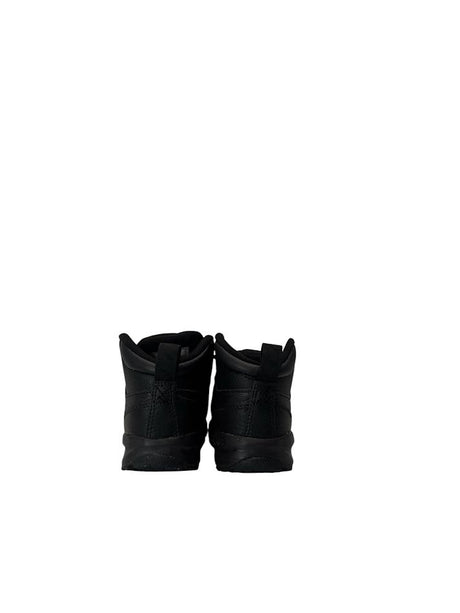 Pair of black boots on a white background