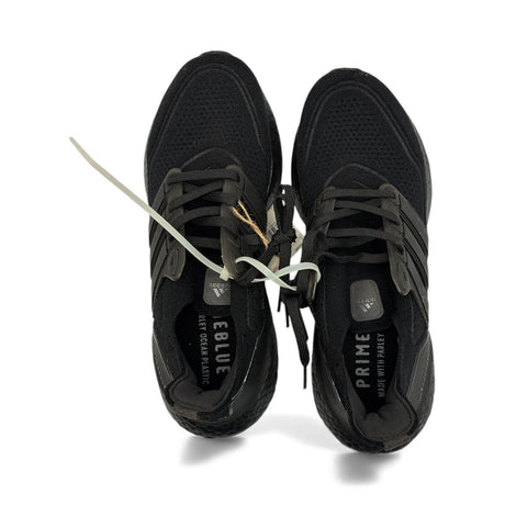 Side view of Adidas Ultraboost 21 with Boost cushioning
