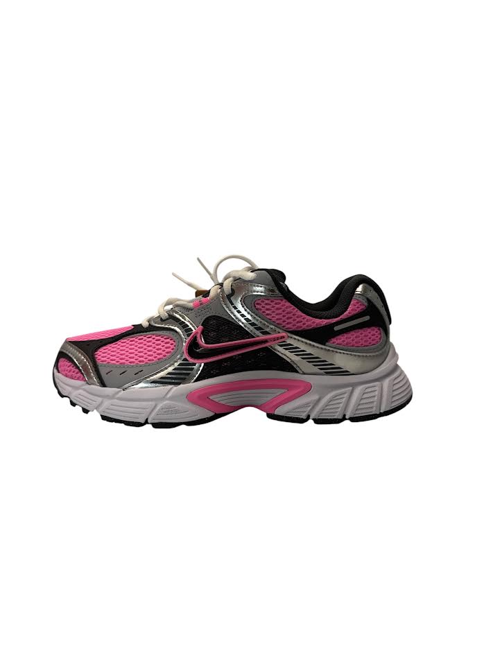 Gray and pink running shoe on a white background