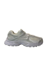 White athletic shoe on a white background
