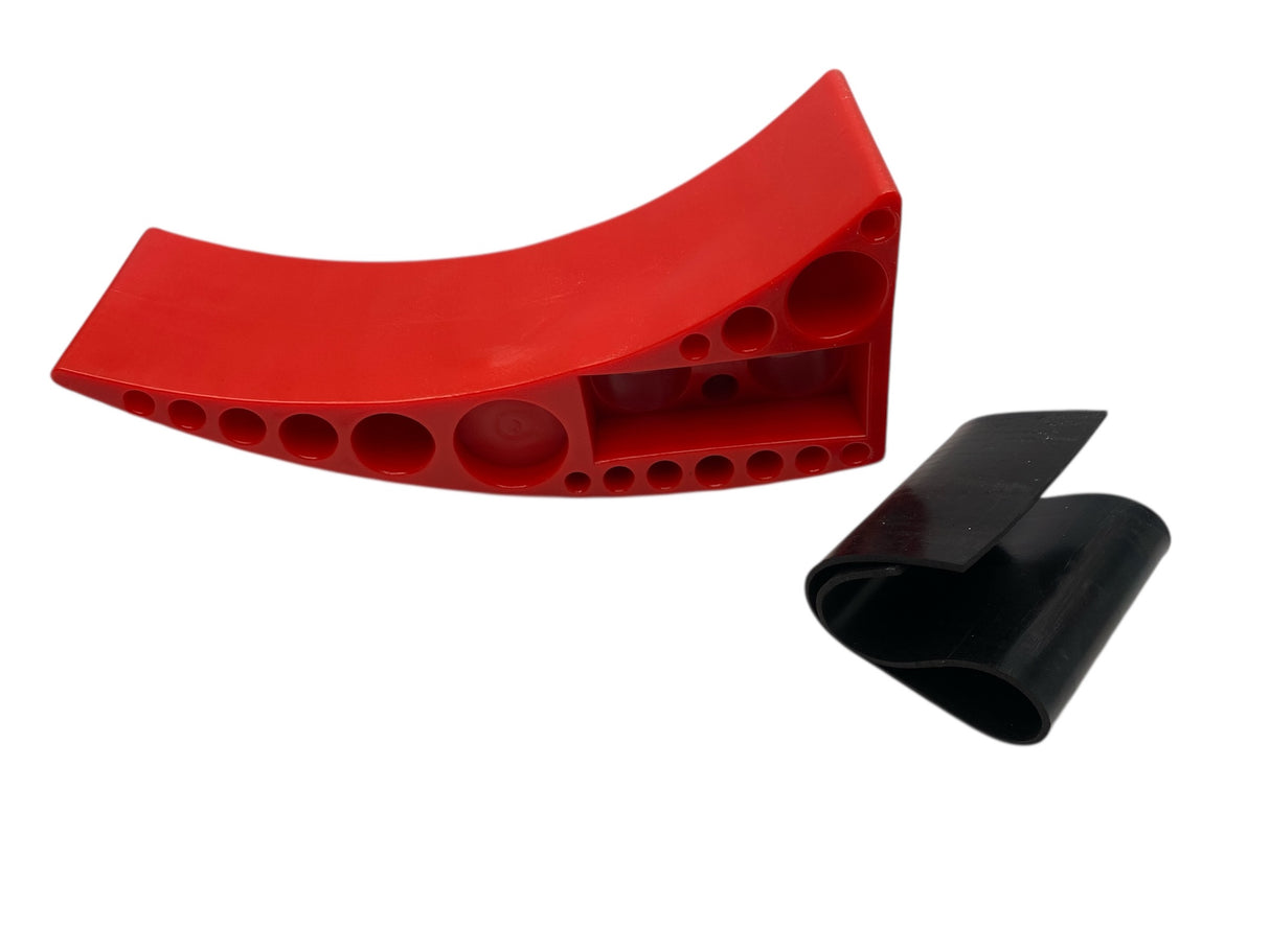 Rapid Jack lifting a dual-axle trailer tire roadside